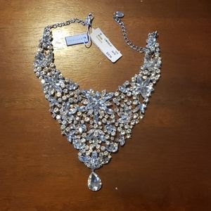 Necklace. Lots of bling.